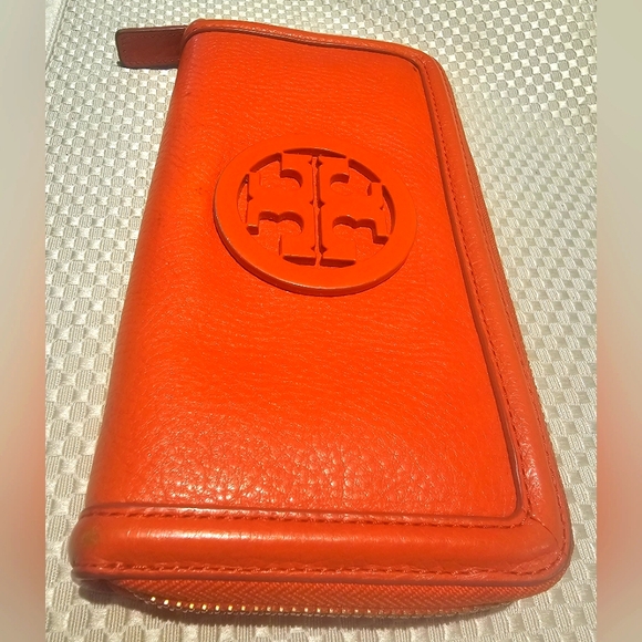 Tory Burch Handbags - Tory Burch Zip around wallet Enamel Medallion Logo Orange Pebbled leather EUC